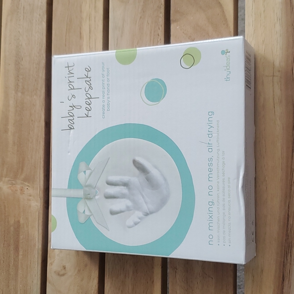 Baby's print keepsake. Brand new